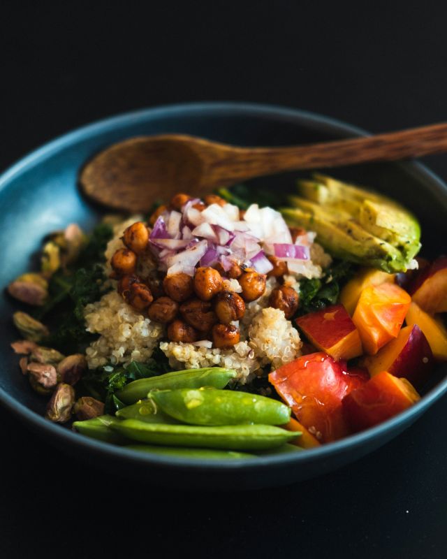 A skillet of chickpeas, spinach and tomatoes